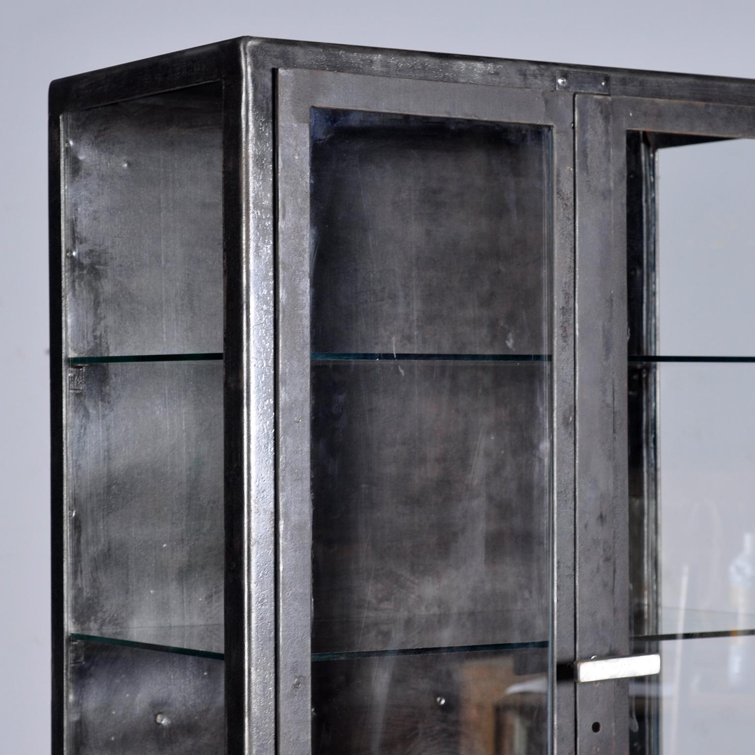 Mid-20th Century polished iron medical cabinet, 1950’s