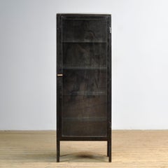 Polished iron medicine cabinet, 1920s
