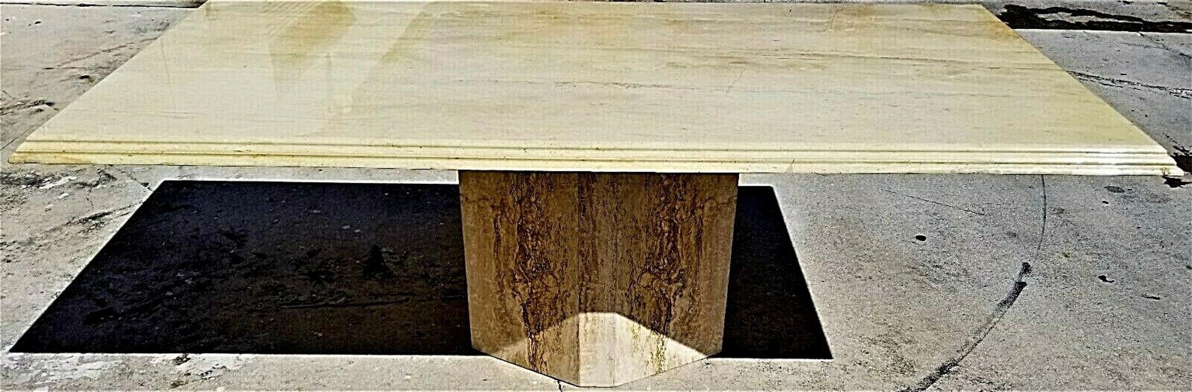 Offering one of our recent Palm Beach estate fine furniture acquisitions of a large mid century modern vintage polished travertine Italian marble dining table with ello base with brass supports.
Approximate measurements in inches
28 3/4