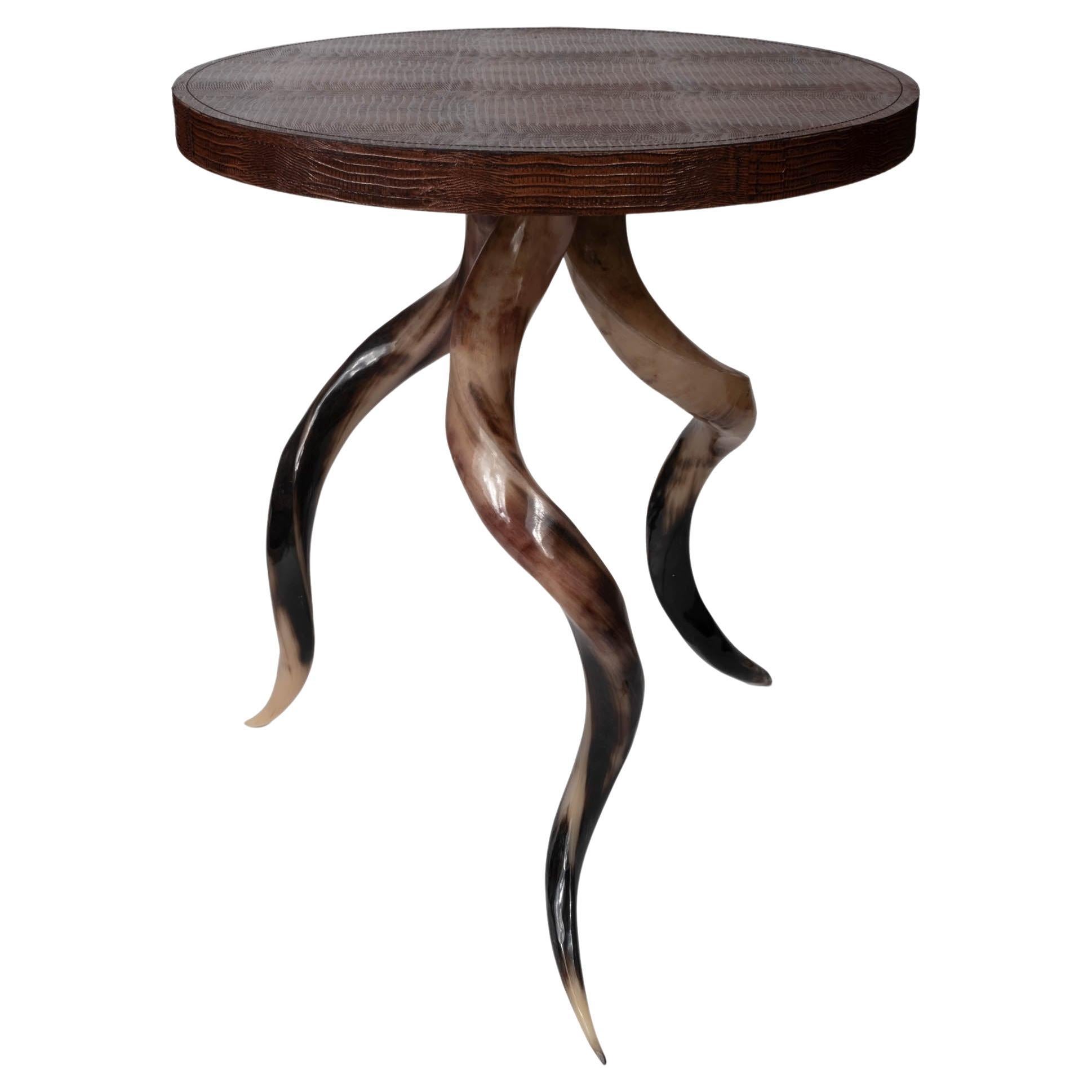 Polished Kudu Horn Table with embossed brown leather top