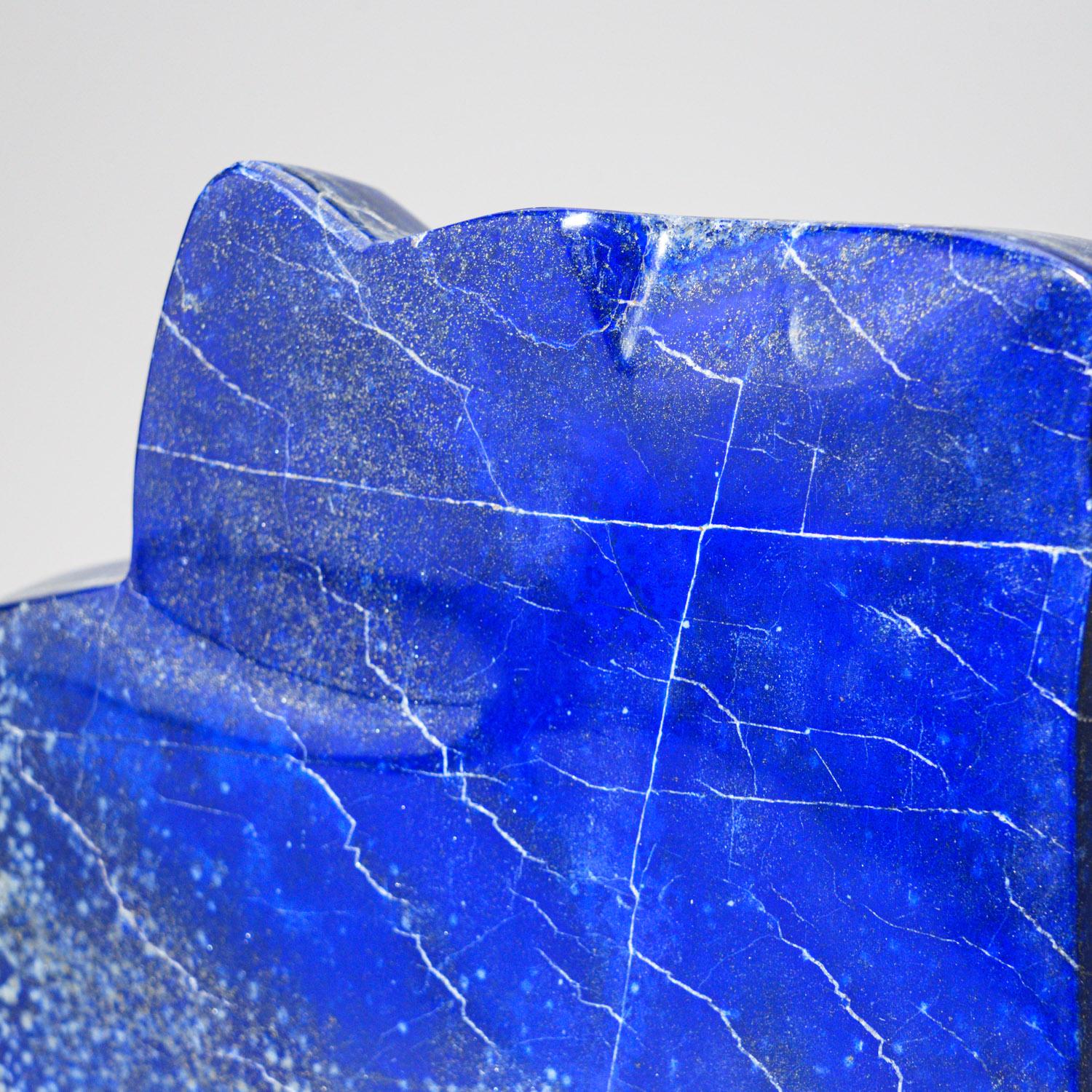 Beautiful hand-polished free form of AAA quality natural Afghani lapis lazuli.  This specimen has rich, electric-royal blue color enriched with scintillating pyrite micro-crystals.

Lapis Lazuli is a powerful crystal for activating the higher mind