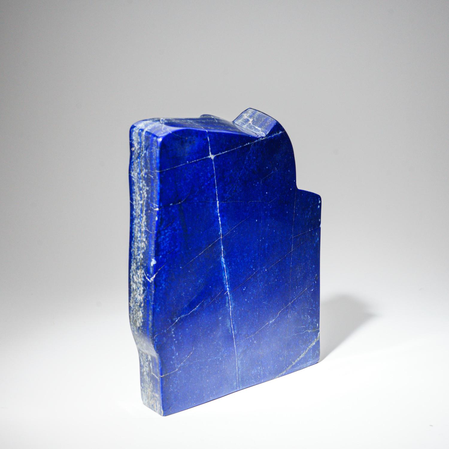 Beautiful hand-polished free form of AAA quality natural Afghani lapis lazuli.  This specimen has rich, electric-royal blue color enriched with scintillating pyrite micro-crystals.

Lapis Lazuli is a powerful crystal for activating the higher mind
