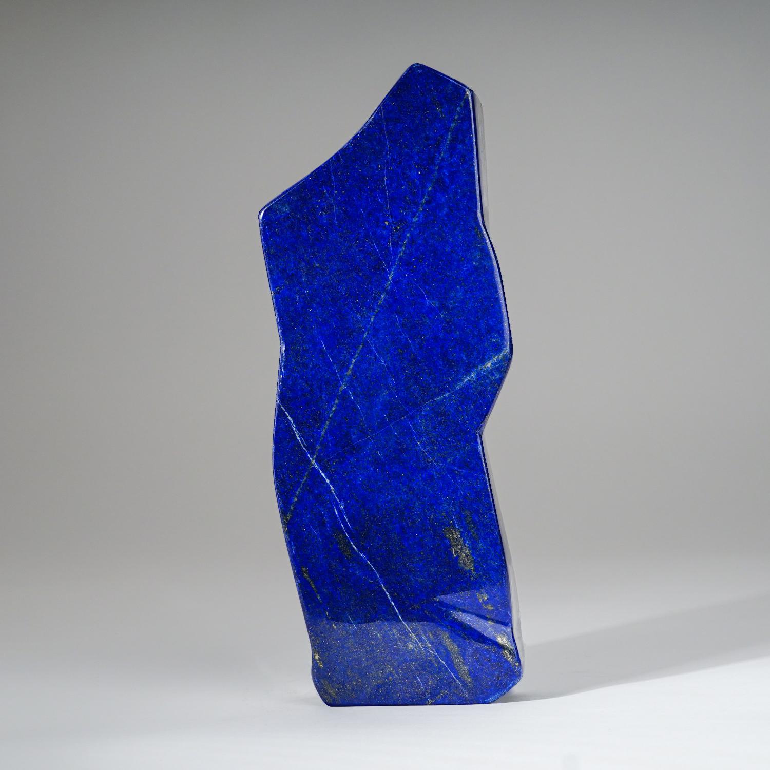 Beautiful hand-polished free form of AAA quality natural Afghani lapis lazuli. This specimen has rich, electric-royal blue color enriched with scintillating pyrite microcrystals.

Lapis Lazuli is a powerful crystal for activating the higher mind