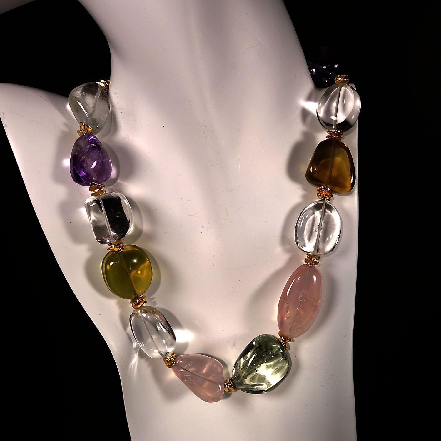 17 Inch necklace of highly polished multi colored quartz nuggets enhanced with gold tone flutters and secured with a gold vermeil hook and eye.  Wear this gorgeous necklace with everything you own!