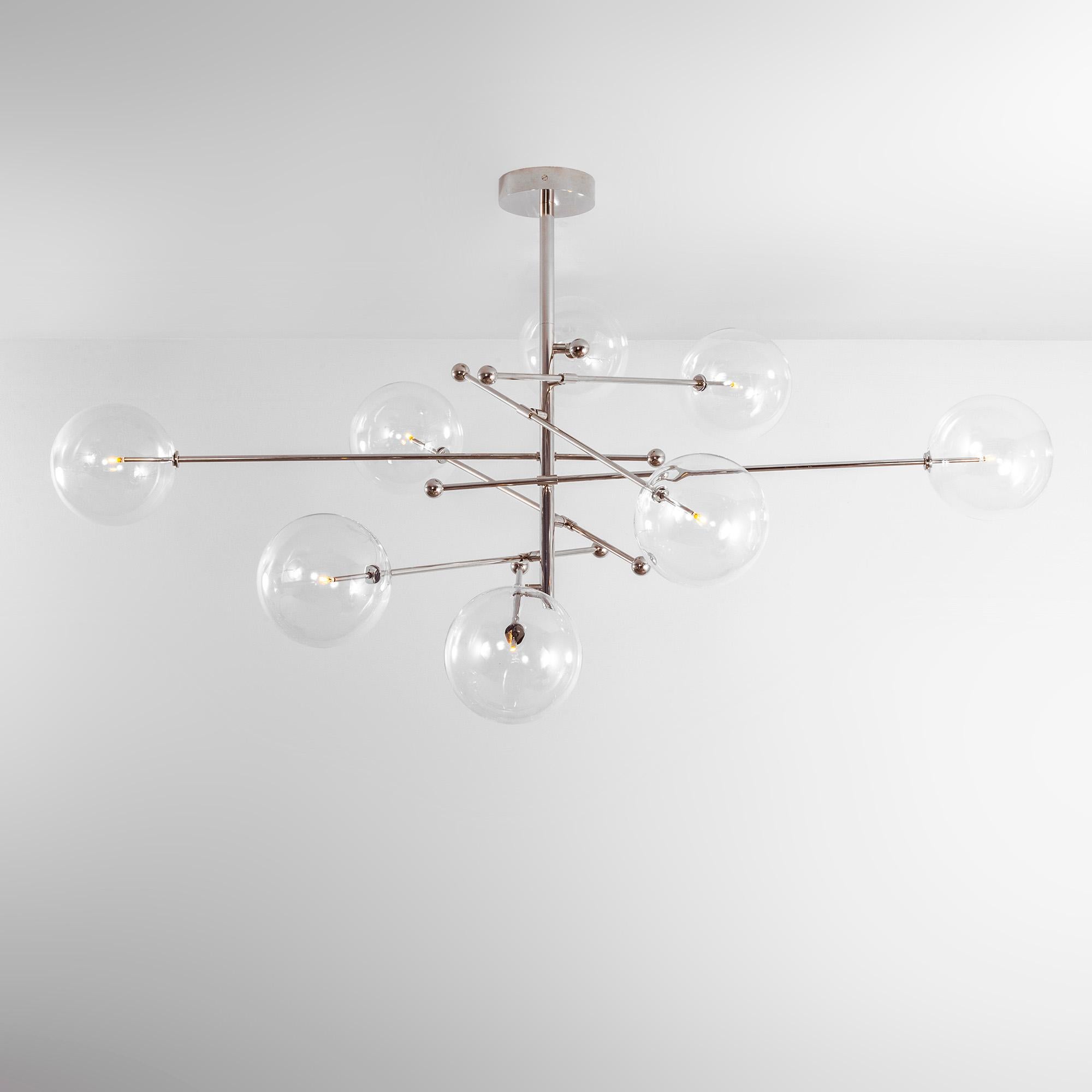 RD15 12 Arms Polished Nickel Chandelier by Schwung
Dimensions: W 140 x D 140 x H 89.1 cm
Materials: Solid Brass. Hand Blown Glass Globes
Finishes: Polished Nickel. Available also in Black Gunmetal, and Lacquered Burnished Brass. 
All our lamps can