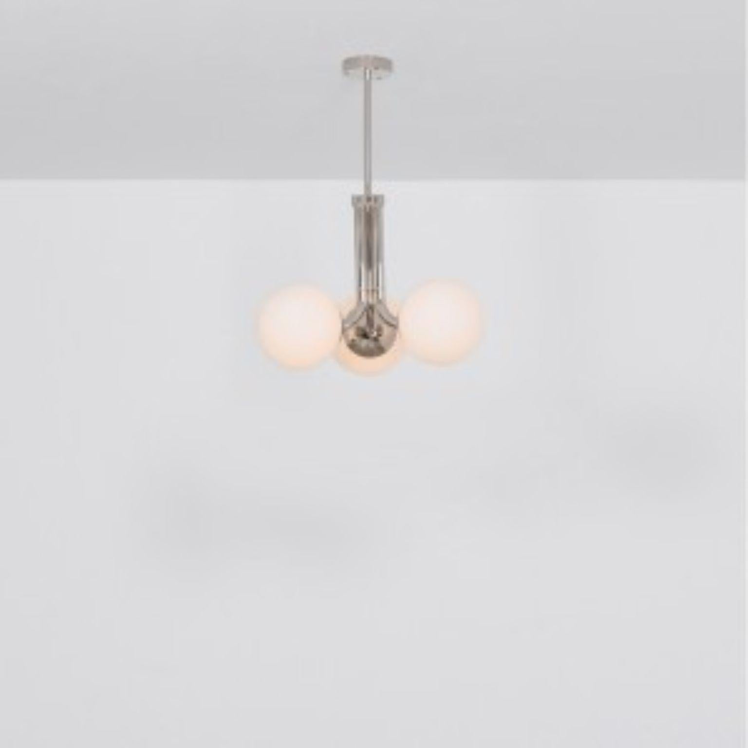 Tubular SM Polished Nickel Pendant Light 3 by Schwung
Dimensions: W 48 x D 48 x H 58 cm
Materials: Polished nickel, frosted glass

Finishes available: Black gunmetal, polished nickel, brass.
  

 Schwung is a german word, and loosely defined, means