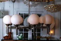 Polished Nickel "Spoke" Form Nine-Arm Chandelier with Frosted Glass Shades