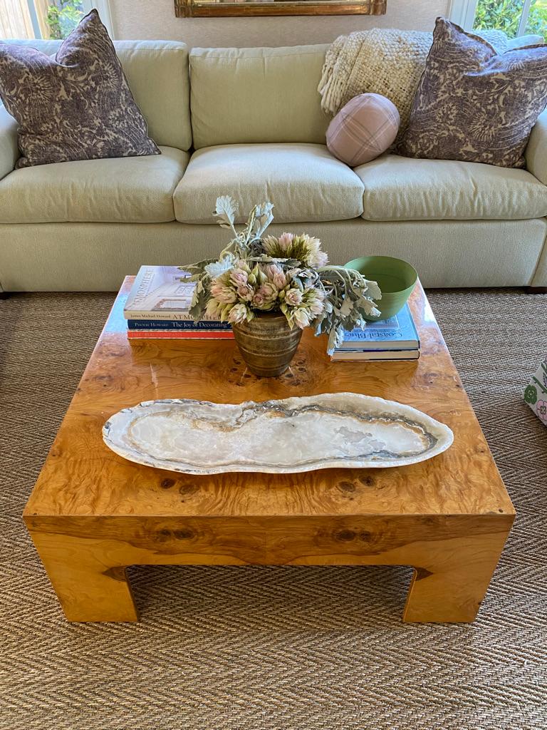 One of a kind polished onyx tray with live edge. Polished on the top and bottom, with mineralization formation in tones of cream, white, taupe and caramel.