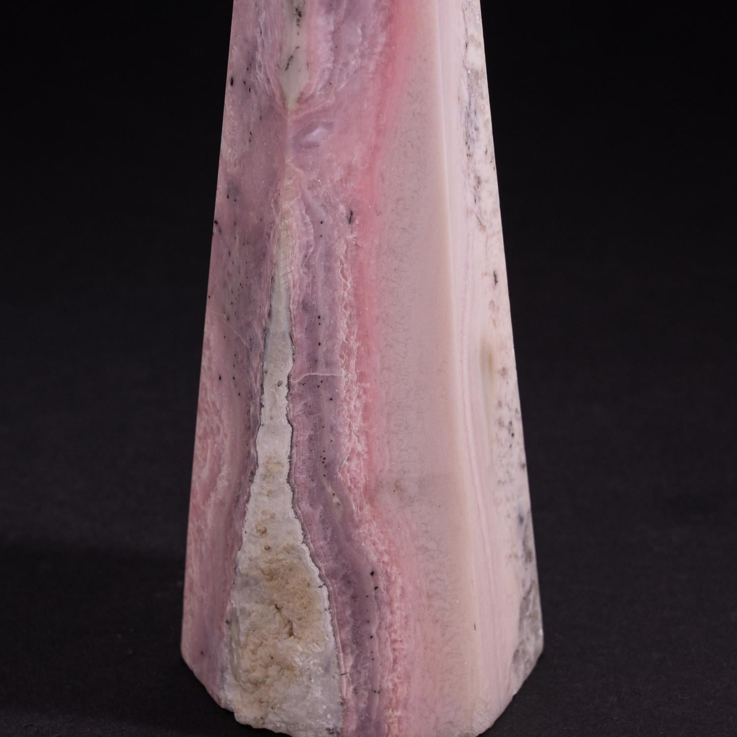 AAA-quality, unique Pink Opal obelisk from Peru. Pink colored, semi-precious gemstone of the Silicate mineral family. It has vibrant hues of light pink with veins of reddish pink, white and grey colors.

Pink Opal is a love stone with a deep