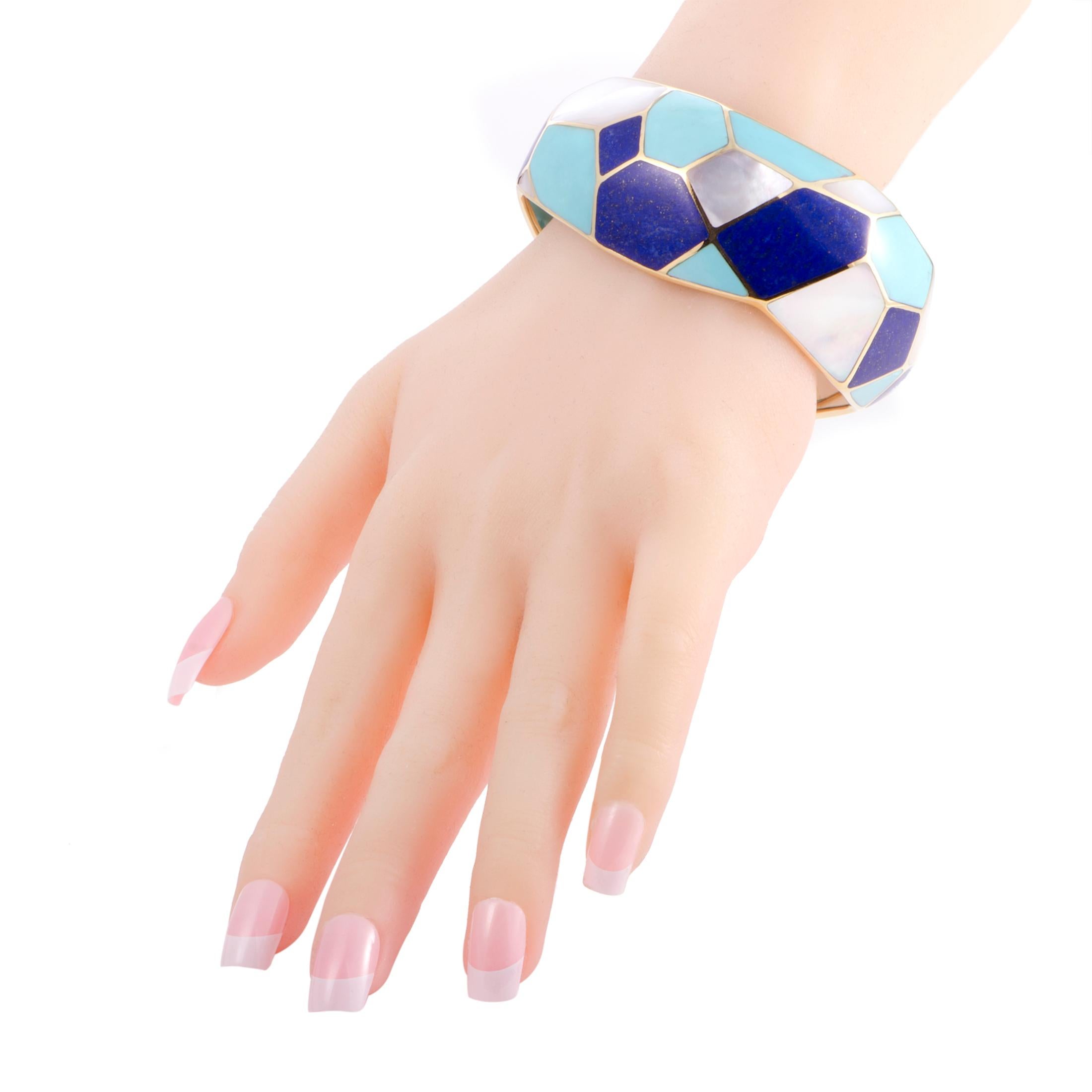 The harmonious sight of splendid lapis lazuli and turquoise stones is joined by the exceptionally feminine mother of pearl in this statement piece from Ippolita. Designed for the attractive “Rock Candy” collection, the bangle is made of