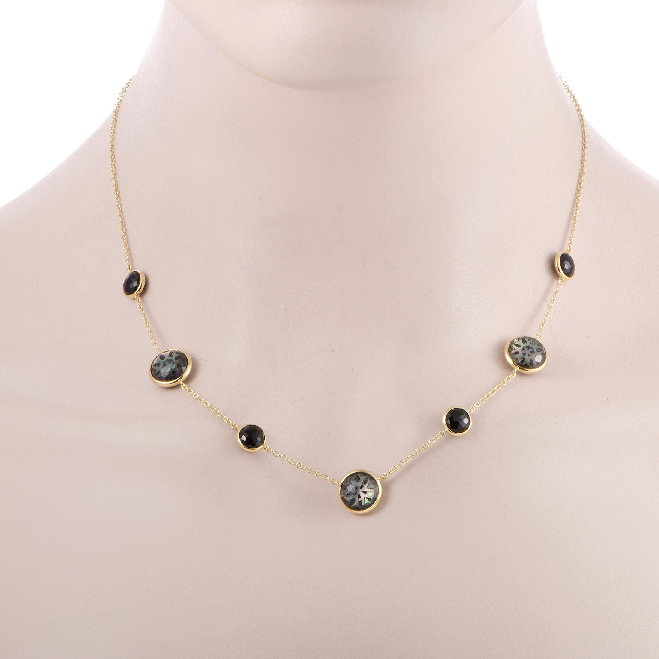 Designed for the exemplary “Rock Candy” collection by Ippolita, this sublime necklace is made of elegant 18K yellow gold and boasts captivating onyx, black mother of pearl and clear quartz, offering eye-catching prestigious appearance.
