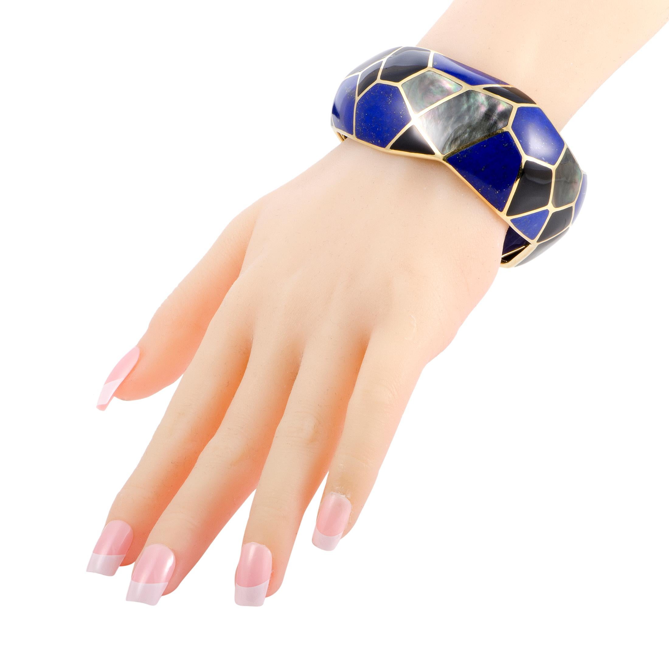 Incredibly attractive, with offbeat fashionable design, this stunning Ippolita bracelet from the “Rock Candy” collection is made of quintessential 18K yellow gold and boasts eye-catching mosaic décor comprised of majestic onyx, lapis lazuli and