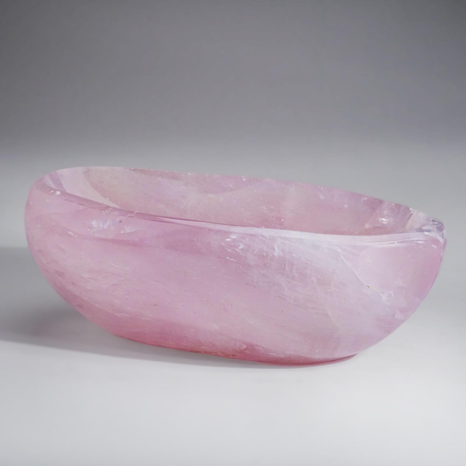 Handmade polished free-form bowl of natural gem translucent rose quartz from Brazil. All sides hand polished to a smooth mirror finish. This will make a beautiful centerpiece to complement your home.

Rose Quartz is the stone of unconditional