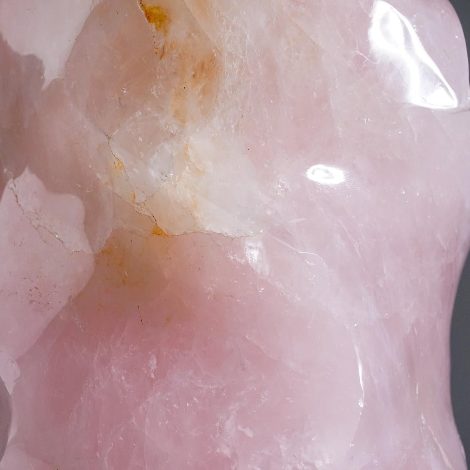 AAA quality, hand-polished flame free-form of natural gem translucent rose quartz from Brazil. This specimen has bright rich color, all sides hand polished to a smooth mirror finish.

Rose Quartz is the stone of unconditional love. One of the most