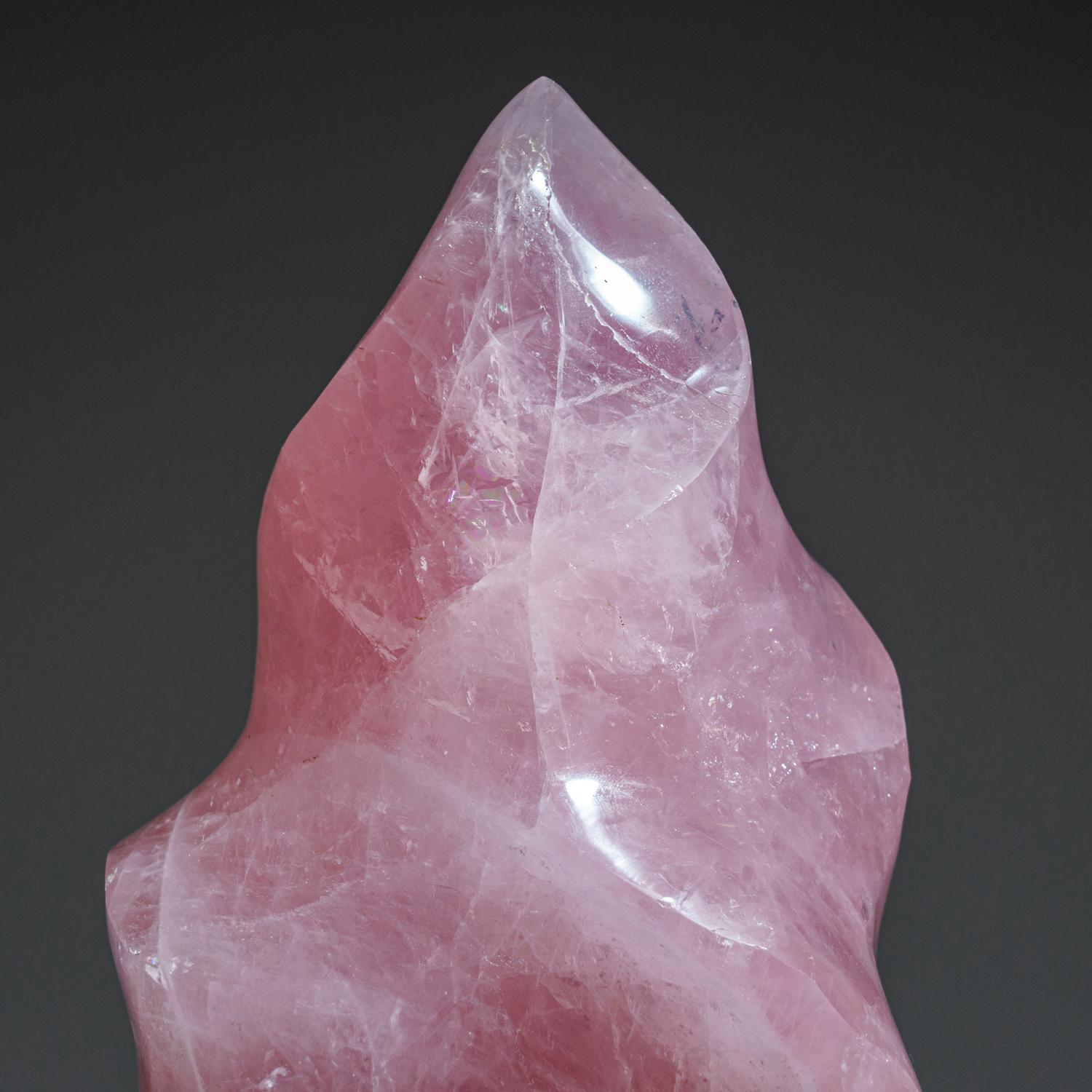 AAA quality, hand-polished flame free-form of natural gem translucent rose quartz from Brazil. This specimen has bright rich color, all sides hand polished to a smooth mirror finish.
Rose Quartz is the stone of unconditional love. One of the most