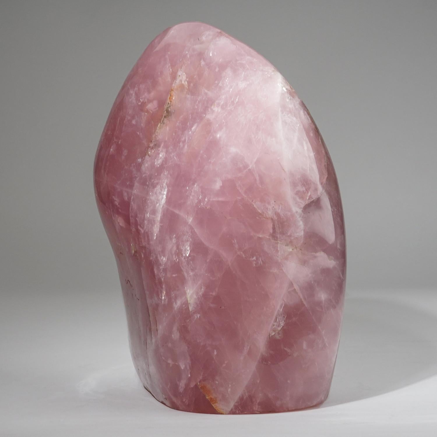 This museum quality, large freeform is carved from a solid piece of natural, gem quality Rose Quartz. This piece has remarkable transparency with a warm pink color. Hand polished to a mirrored finish.

Rose Quartz is the stone of unconditional love.