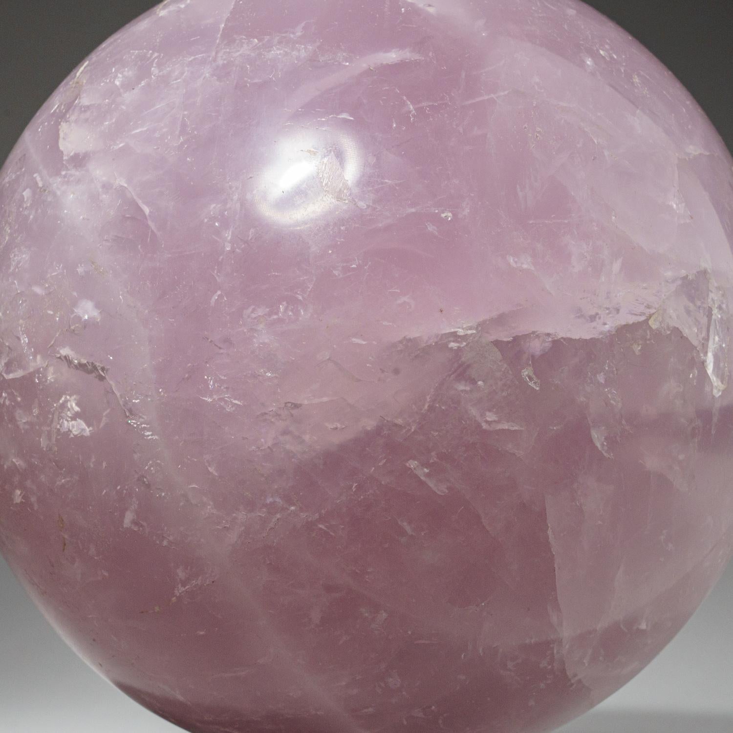 This top quality, hand-polished Rose Quartz Sphere from Madagascar is a stunning pink stone, often used in Heart Chakra work to promote feelings of unconditional love. It is associated with calming and soothing energies, and is known to attract