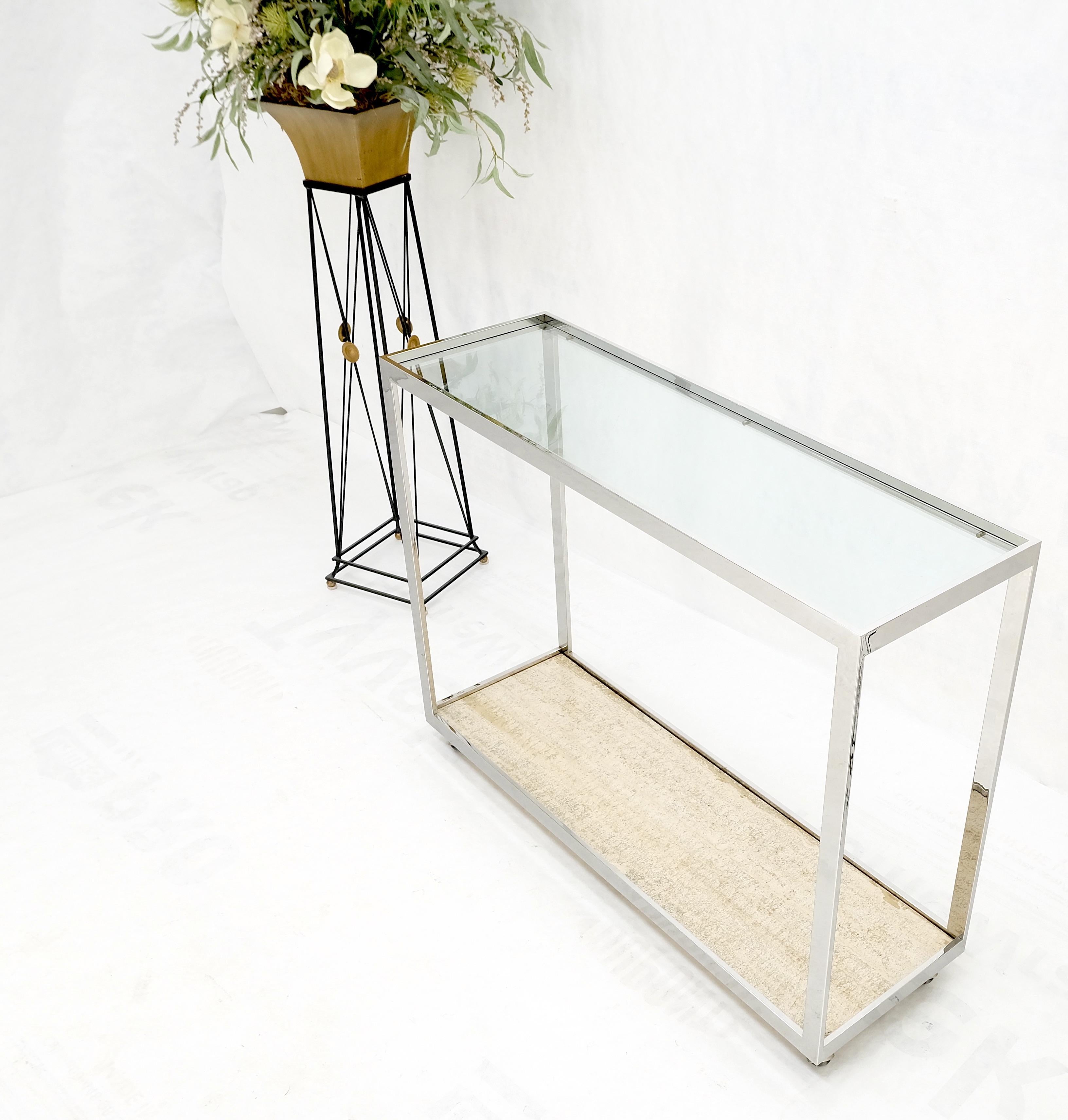 Mid-Century Modern Polished Stainless Steel Glass Top Travertine Bottom Rectangle Console Table For Sale