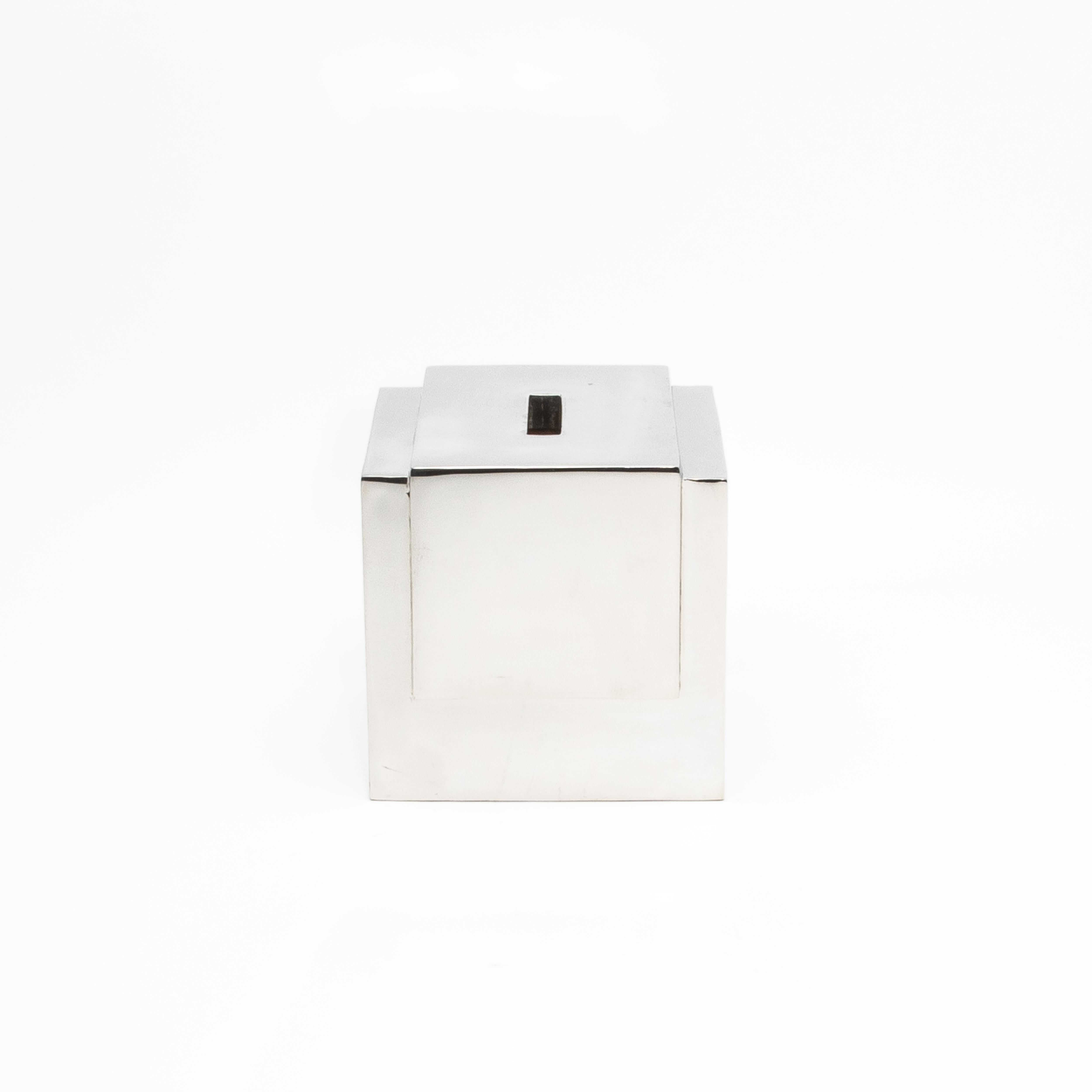 Elevate the everyday with this exquisite Polished Stainless Steel Tissue Box by R&Y Augousti, a testament to unparalleled craftsmanship and luxurious materials. Each piece is meticulously hand-crafted from solid steel, polished to a high sheen that
