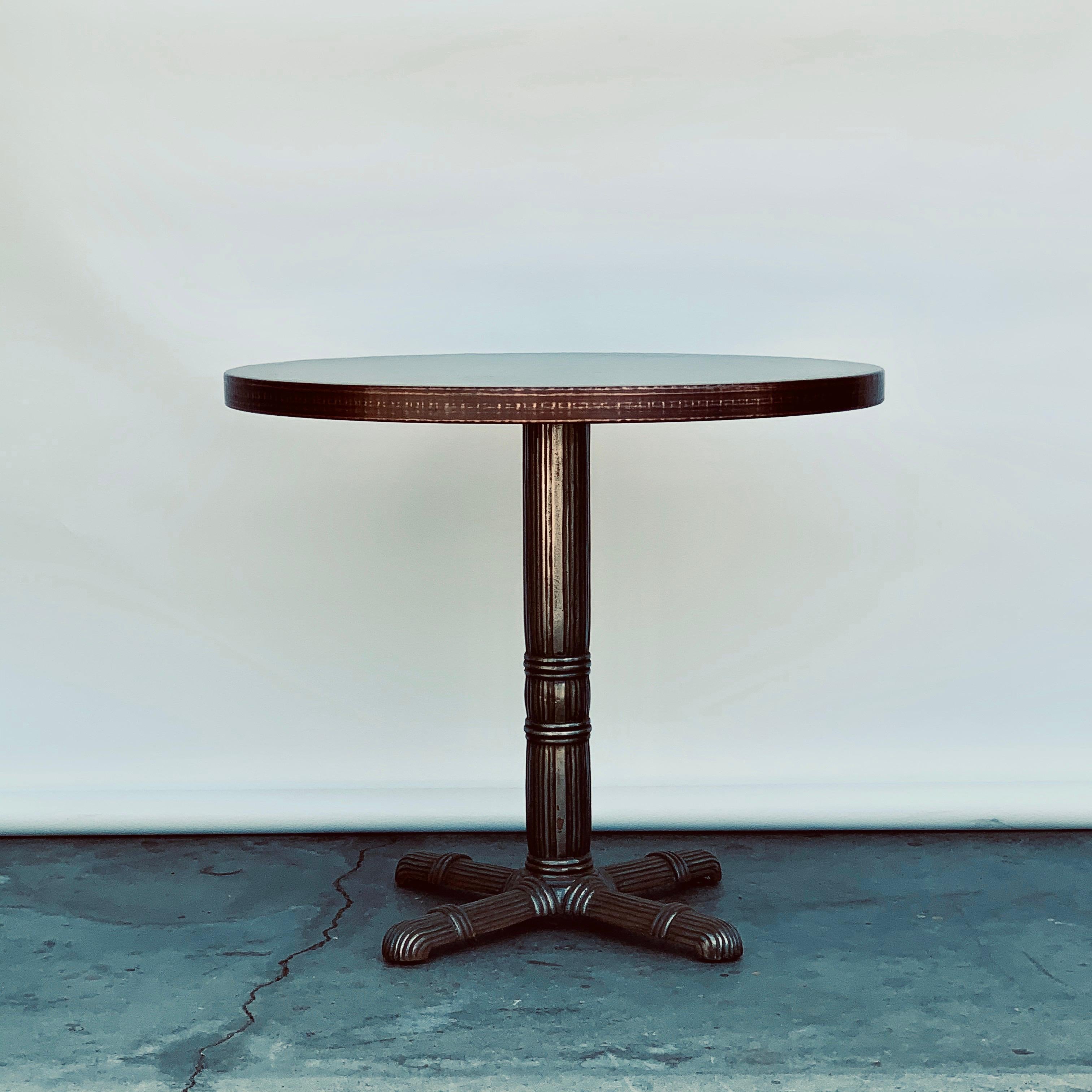 Polished steel and raw copper top gueridon / side table.

Polished steel French Art Deco base with an antiviral raw copper top (researchers reported last month that the novel coronavirus causing the COVID-19 pandemic survives for days on glass and