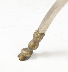 Polished steel and leather ottoman stool by Maison Charles