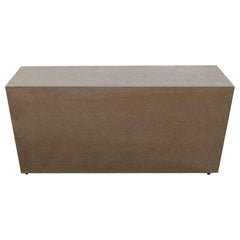 Table basse à socle en acier poli