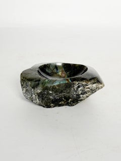 Polished stone with green highlights, France, 1950