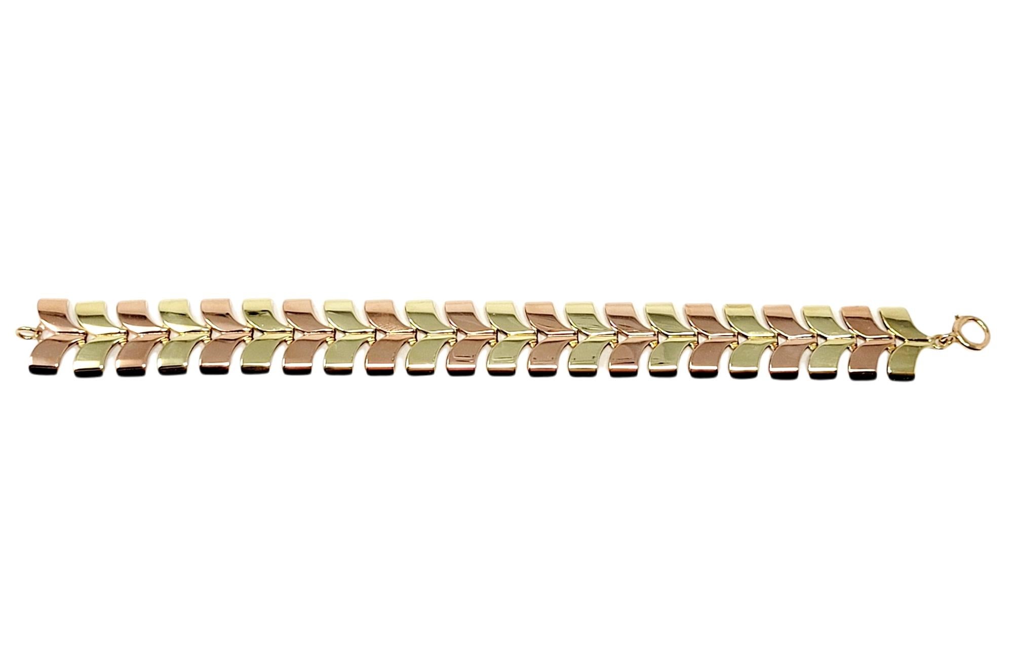 Contemporary Polished Two-Tone 14 Karat Yellow and Rose Gold Chevron Style Link Bracelet For Sale
