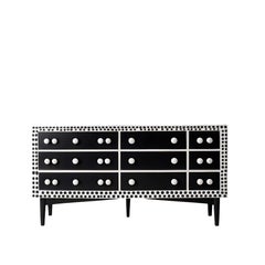 Commode noire à incrustation de pois