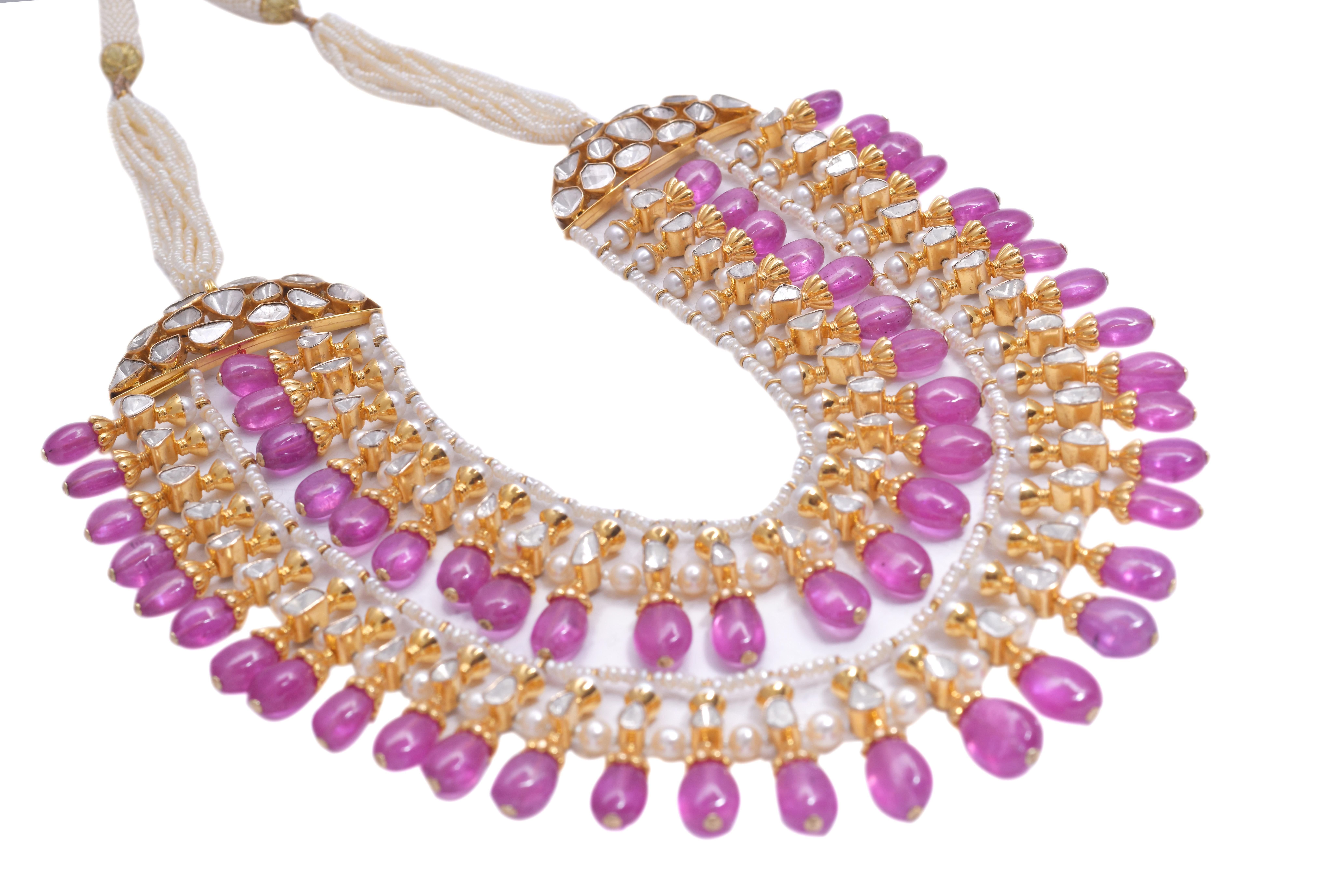  Gold nw 128.840gm 18k necklace
polki 11.05cts
pinksapphire 342.91cts
pearl 137.45cts