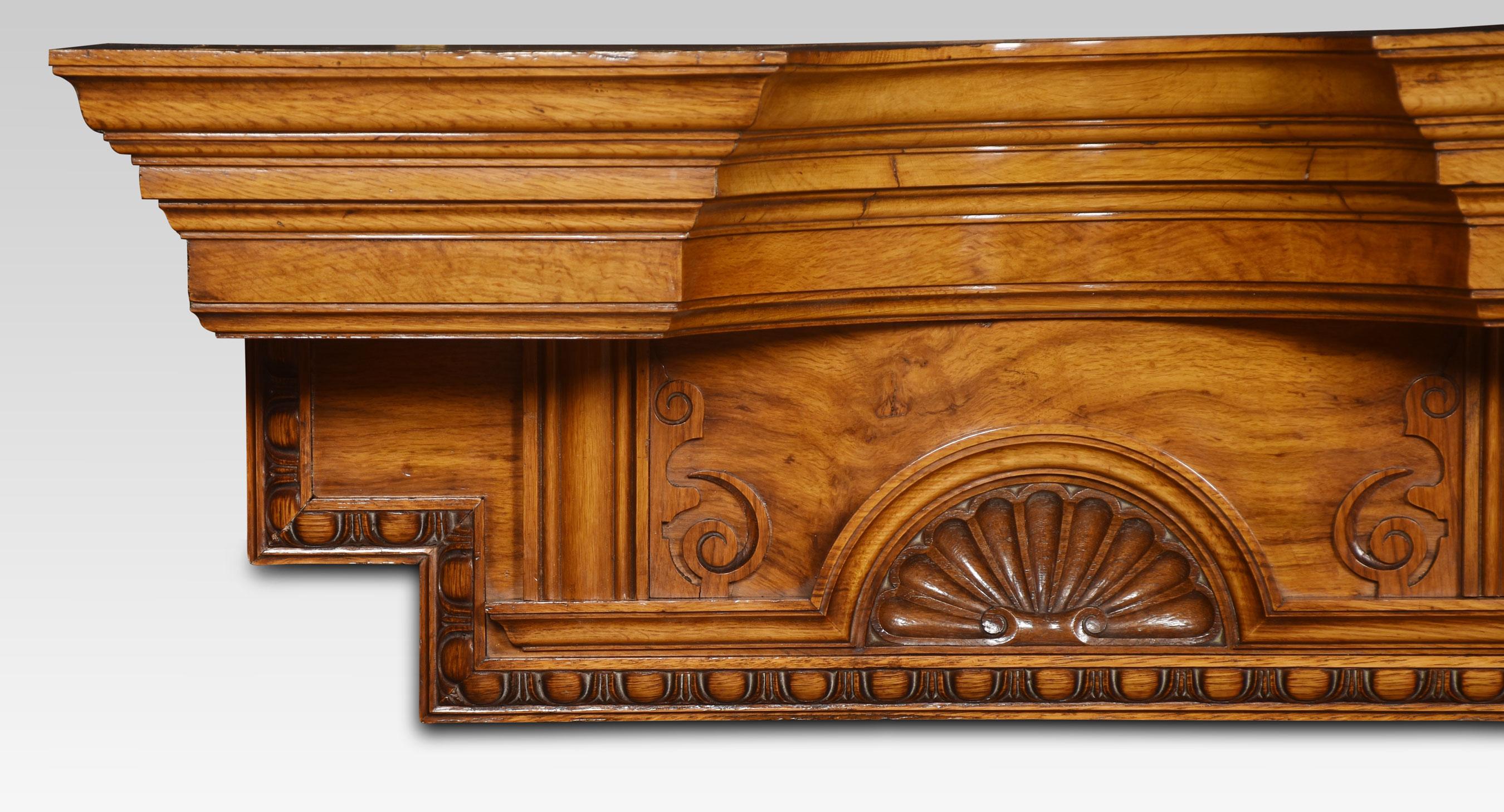 Pollard oak overdoor pediment the concaved top above shell carved cartouches flanked by scrolling decoration.
Dimensions
Height 14.5 Inches
Width 56 Inches
Depth 10 Inches.