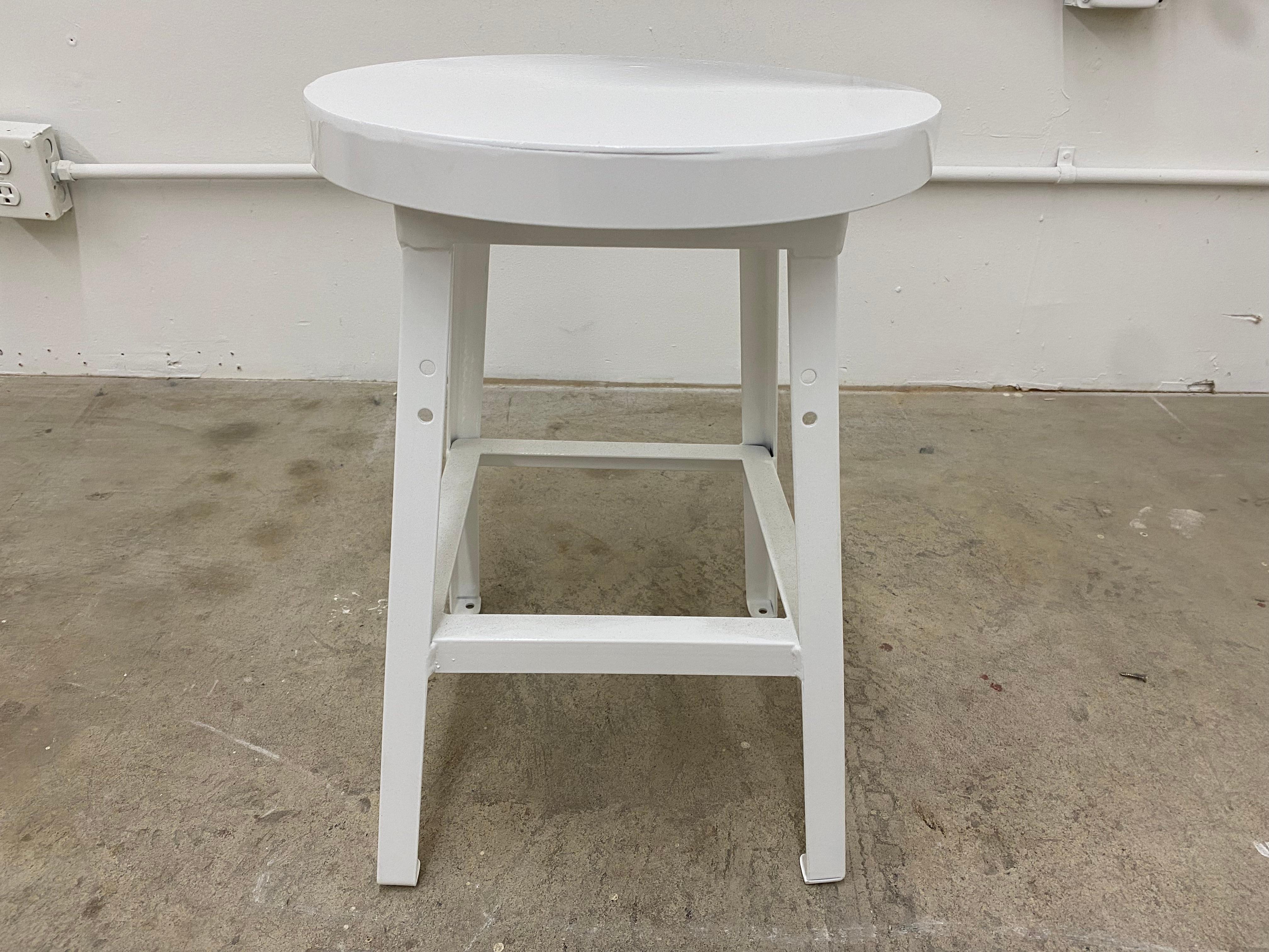Set of 4 stools by Pollard, Chicago. Features fresh white gloss powder coat. Excellent clean and simple vintage addition to any space. In excellent vintage condition as pictured. 

Dimensions: 14in Diameter x 19in H