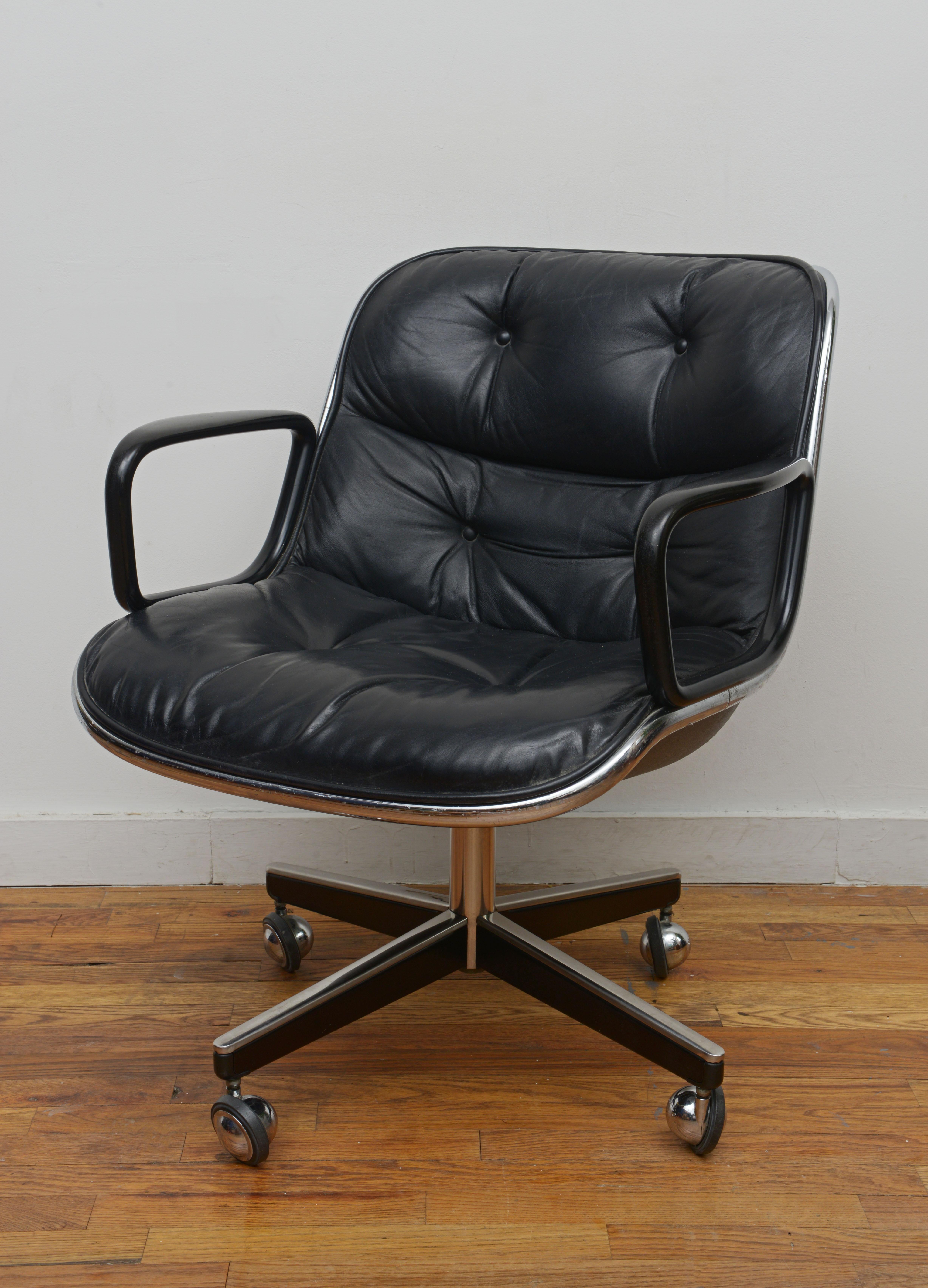 Let’s talk about a classic office chair. This Charles Pollock Executive chair for Knoll in black leather is an iconic 70s design and perfect for any work space. The big vintage ball casters help this chair roll easily even on thicker surfaces like