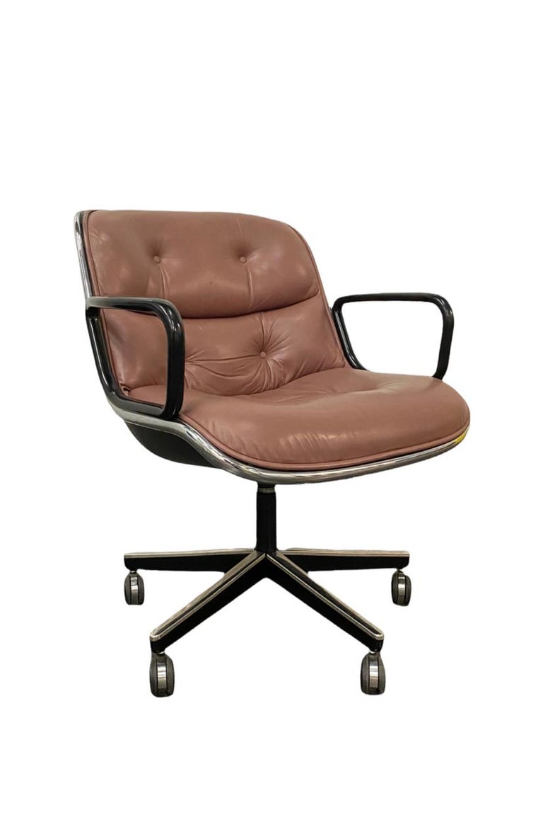 Vintage Charles Pollock for Knoll executive chair with light brown leather. This executive desk chair has a tilt and swivel base with adjustable height. All wheels are in working condition. Leather is in fantastic shape with plastic mold black back.