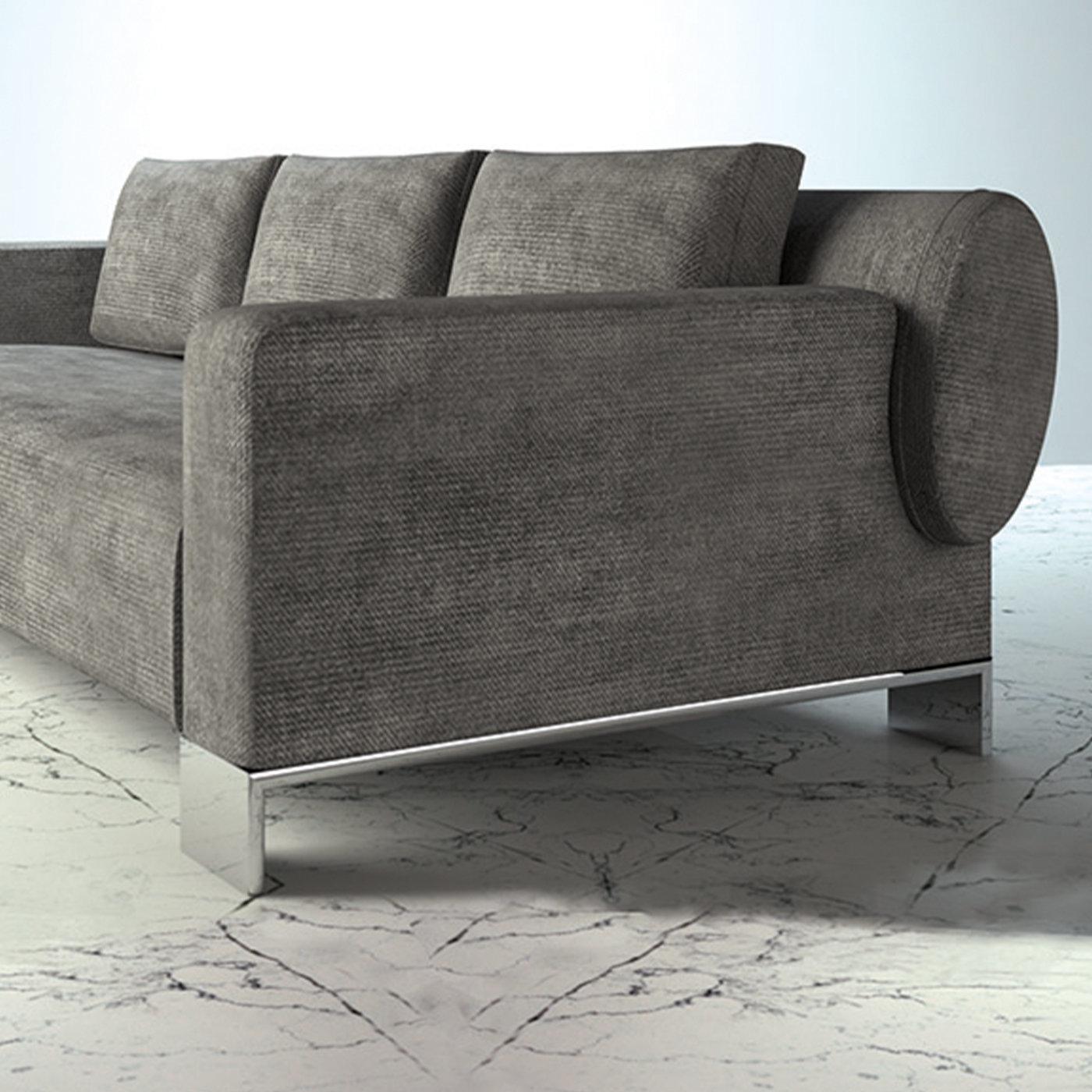 A gorgeous design by Giannella Ventura, this sofa is named after abstract painter Jackson Pollock. In contrast with the namesake artist's expressive lines, it is defined by clean and minimalist geometric shapes entirely upholstered with a timeless