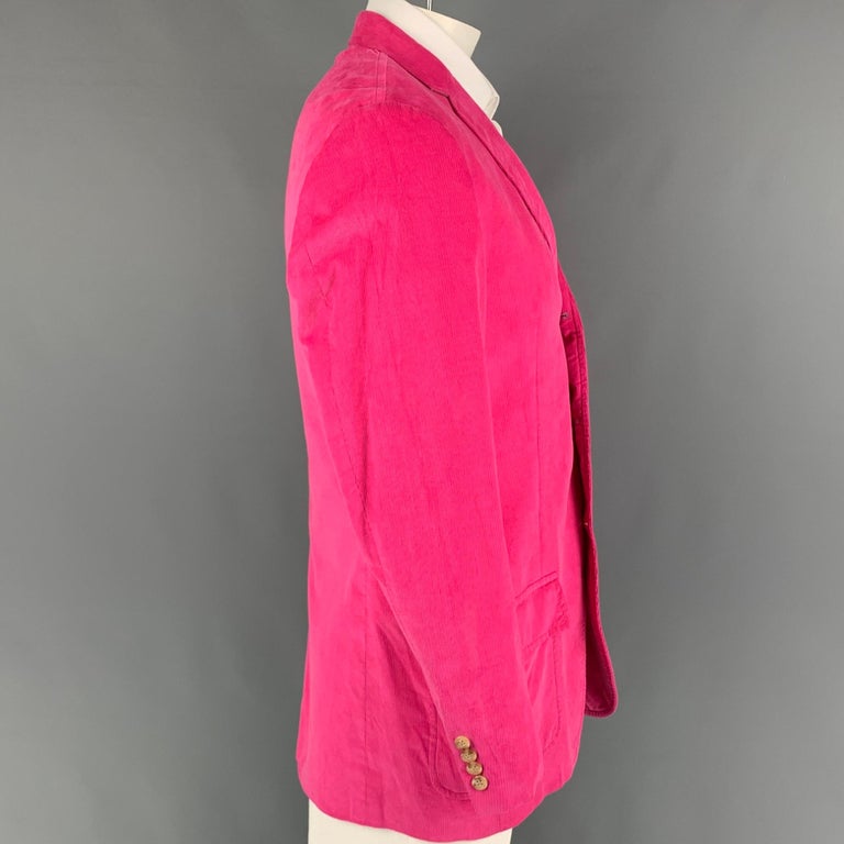 POLO by RALPH LAUREN sport coat comes in a hot pink corduroy with a full liner featuring a notch lapel, flap pockets, single back vent, and a three button closure. Made in Italy. 

Good Pre-Owned Condition.
Marked: 42 L

Measurements:

Shoulder: