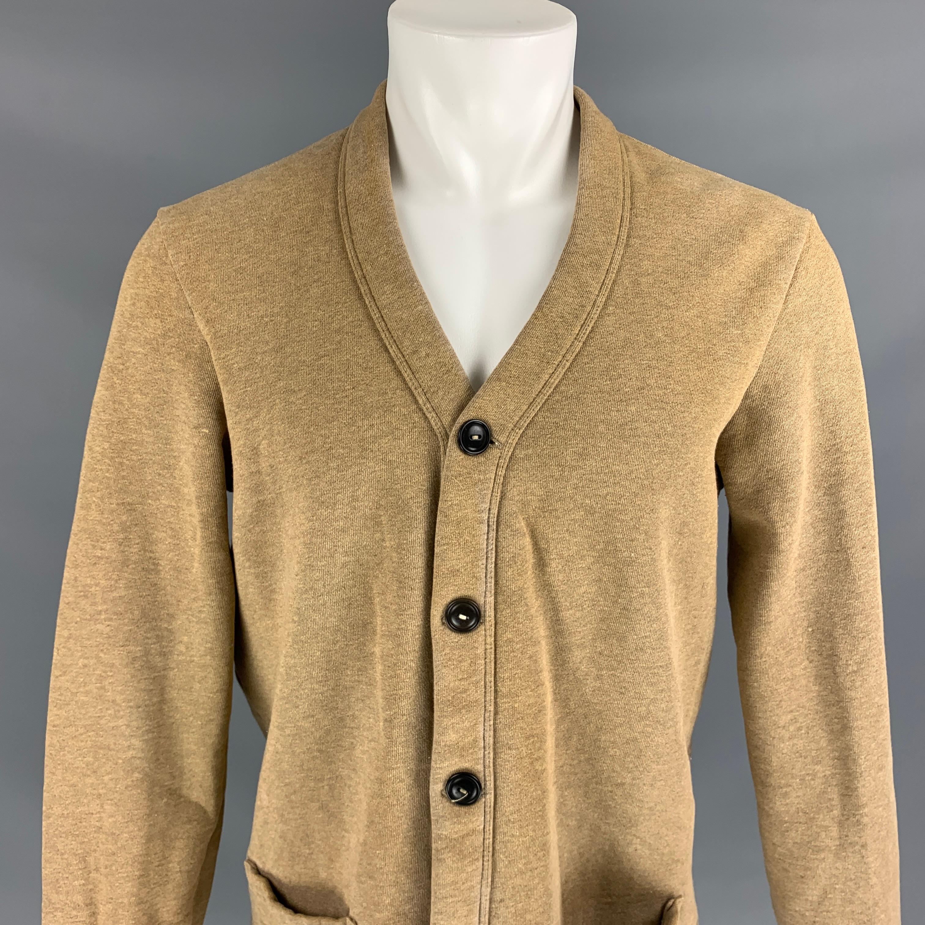 POLO by RALPH LAUREN cardigan comes in a tan cotton / polyester featuring front pockets and a buttoned closure. 

Very Good Pre-Owned Condition.
Marked: M

Measurements:

Shoulder: 18.5 in.
Chest: 40 in.
Sleeve: 27.5 in.
Length: 27 in. 