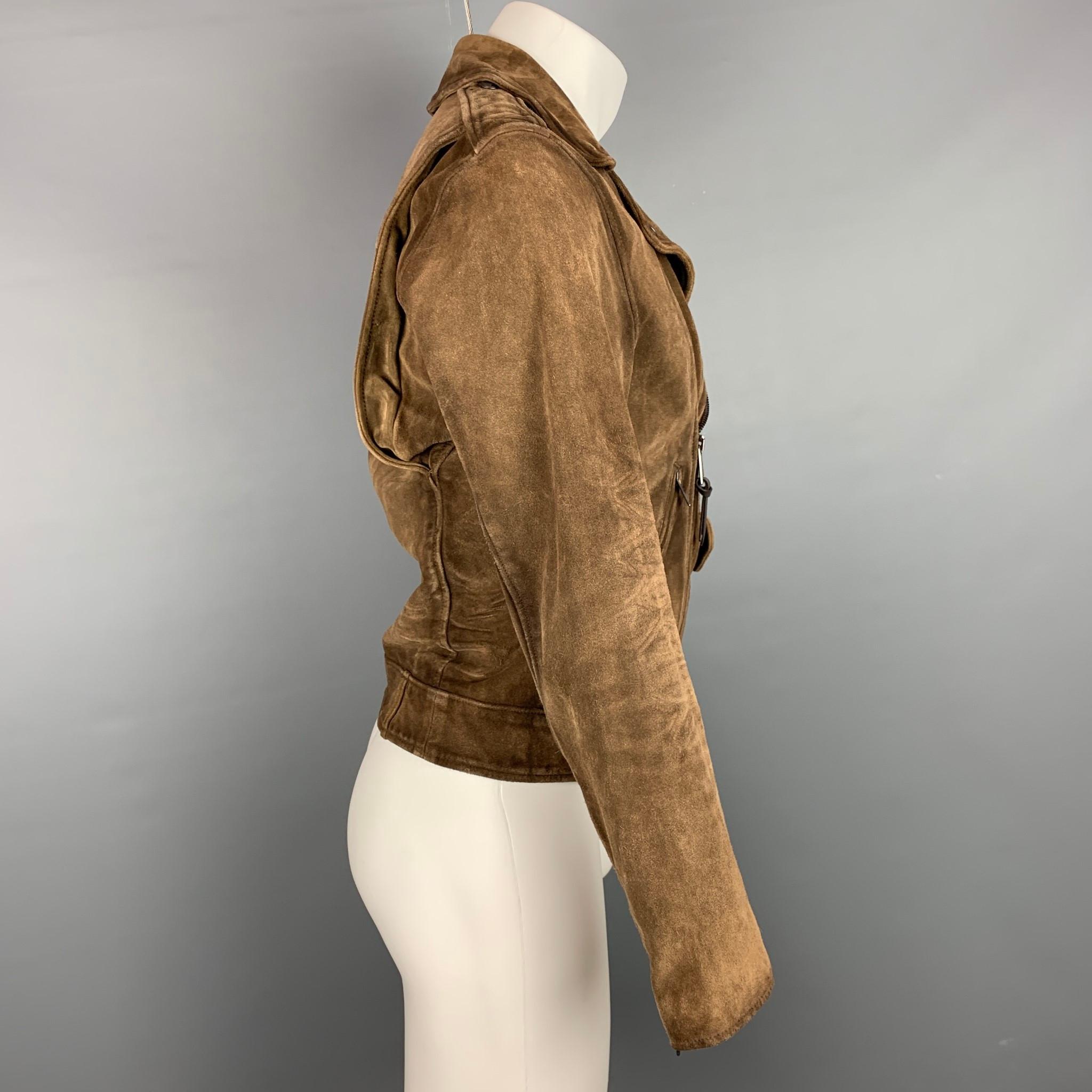 POLO by RALPH LAUREN jacket comes in a brown suede with a full liner featuring a motorcycle style, front zippers, snap button details, and a asymmetrical zip up closure. As-Is.

Good Pre-Owned Condition.
Marked: S

Measurements:

Shoulder: 18
