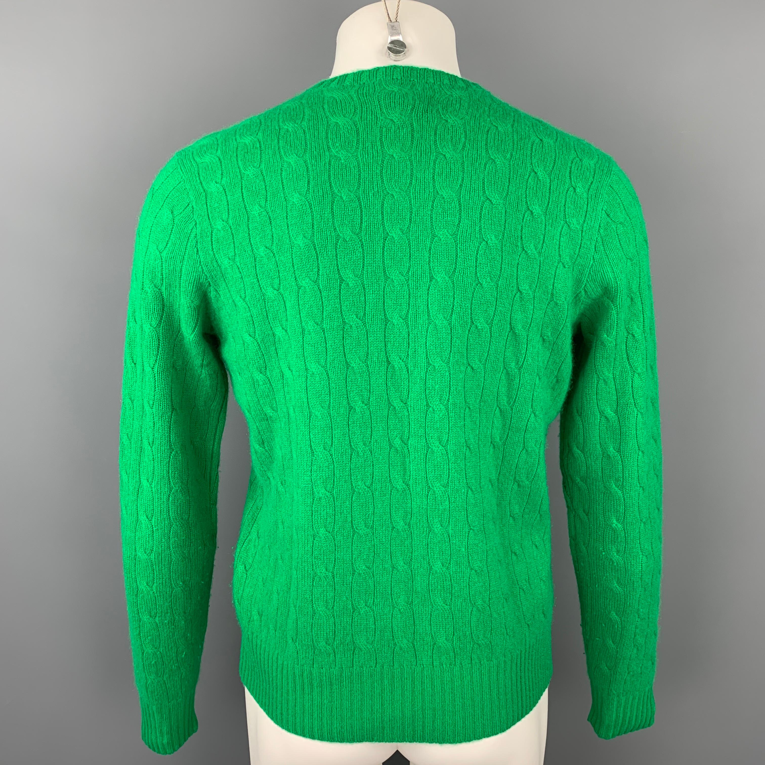 green polo sweater