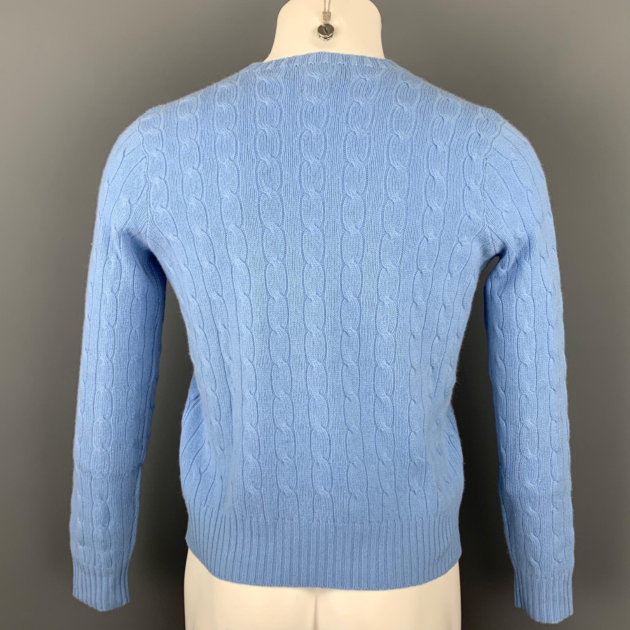 light blue polo sweater
