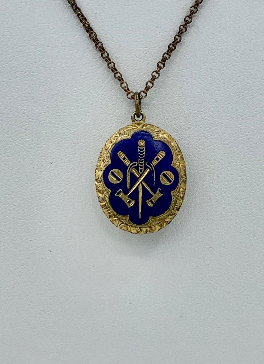 This is a rare and wonderful Art Deco - Victorian Polo Motif Locket Pendant Necklace with images of Polo including the mallet and ball in Royal Blue Enamel over a Gold Filled repousse engraved locket.   How rare to find a Polo motif locket.  The