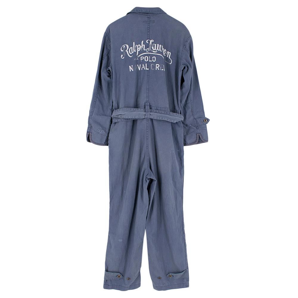 Ralph Lauren blue linen blend boilersuit with a collared neckline featuring embroidery on back and a waist belt

Please note, these items are pre-owned and may show signs of being stored even when unworn and unused. This is reflected within the