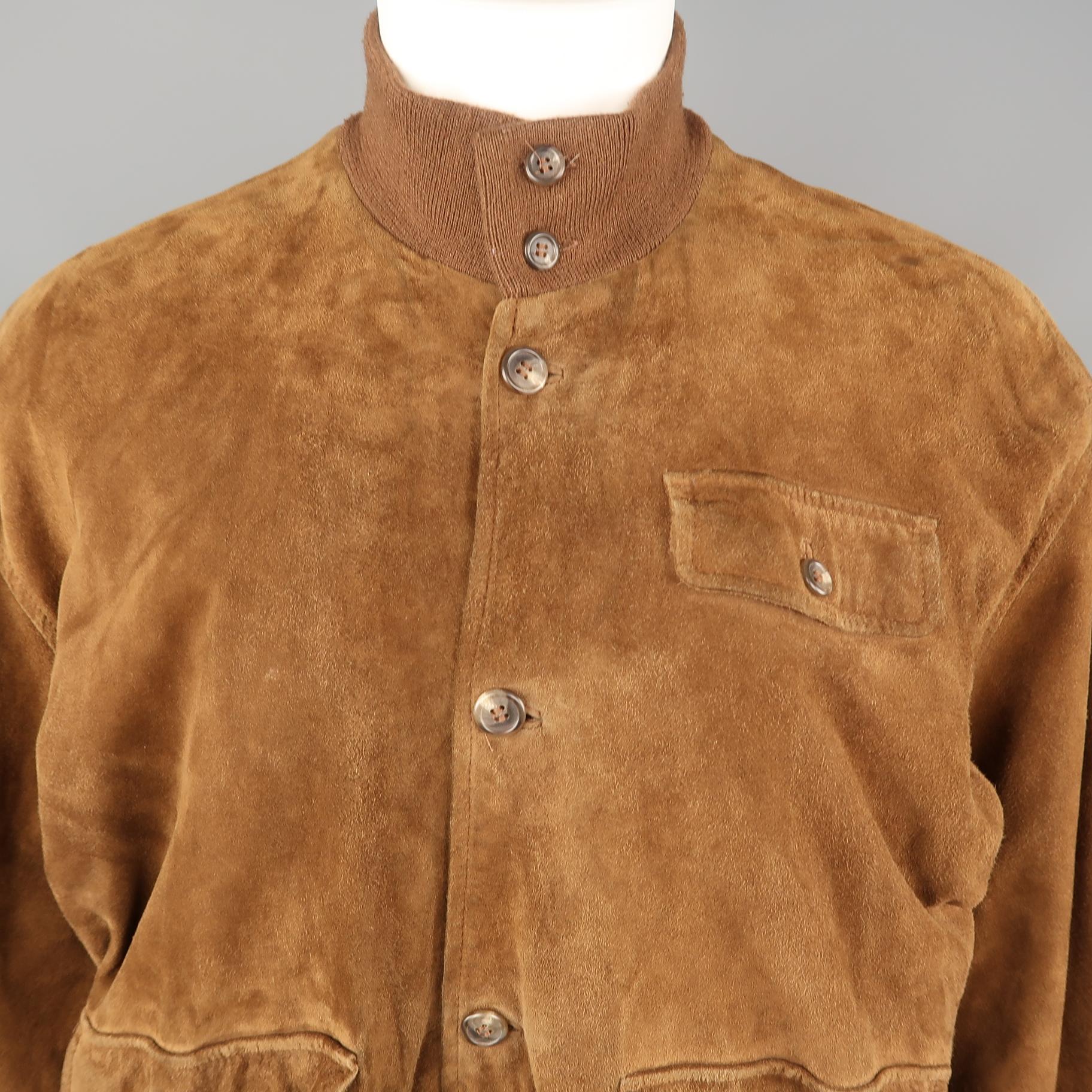 POLO RALPH LAUREN bomber jacket comes in soft brown suede with a knit high collar, patch flap pockets, and plaid liner. 
 
Good Vintage Pre-Owned Condition. Wear throughout and hole in back. As-is.
Marked: M
 
Measurements:
 
Shoulder: 23 in.
Chest: