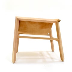 Lounge armchair in Lenga wood and leather seat