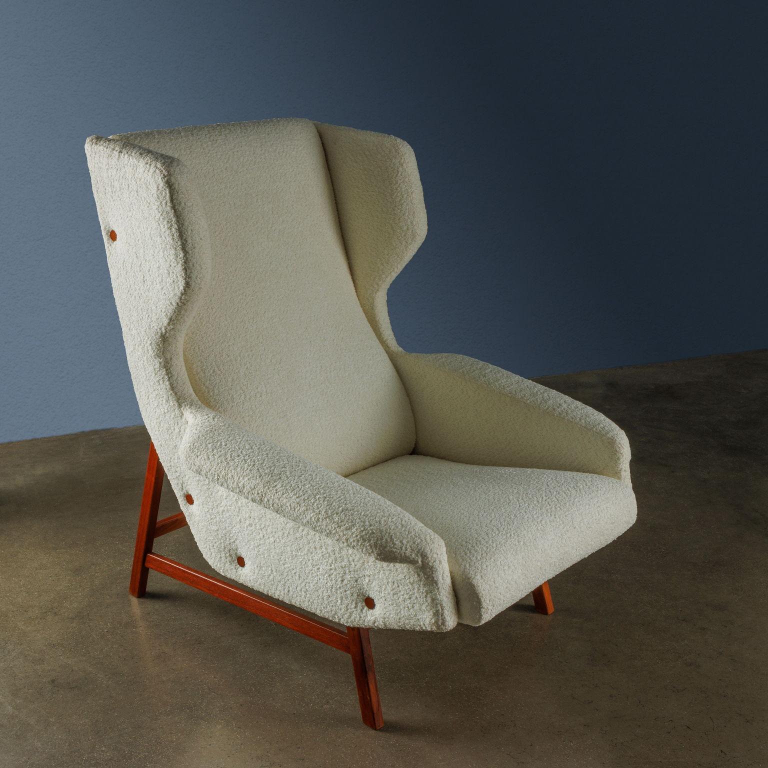 Armchair with teak structure, foam padding, velvet covering.