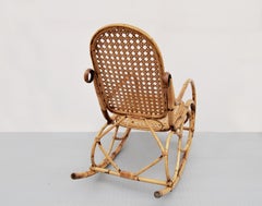 Poltrona a dondolo Mid Century in bambù e rattan, Italia, anni '60