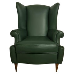 Bergère armchair in green leather