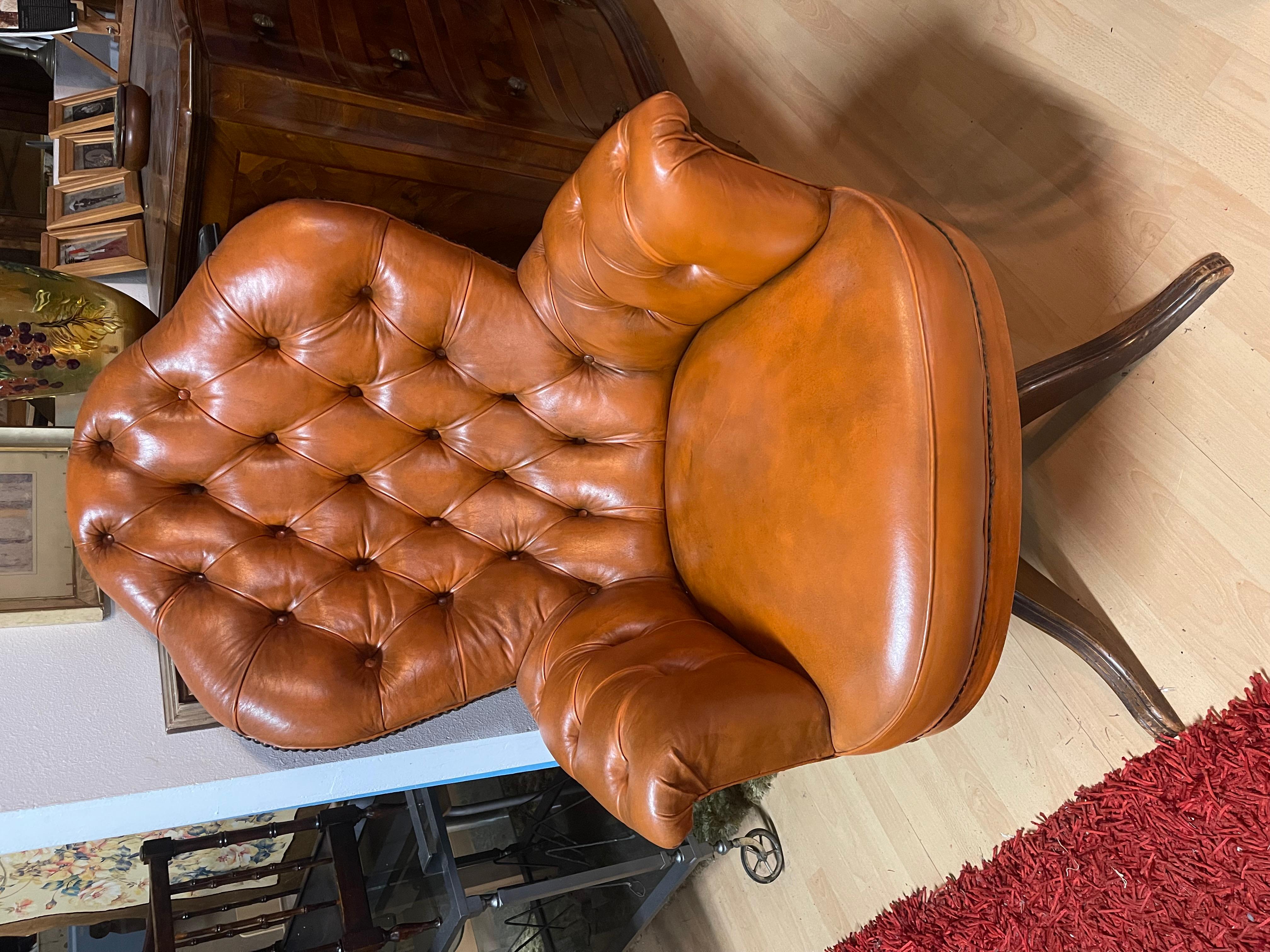 Italian Chesterfield leather swivel armchair italy 1980s For Sale
