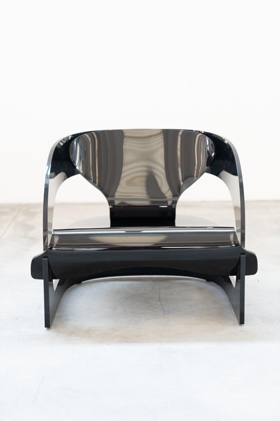 Colombo Joe armchair for Kartell, 1980s
Mod.4801, limited numbered series no.217. Structure formed by assembling 3 polycarbonate elements and black rubber stop. Columbus was en extreme defender of the unity between structure and material. This