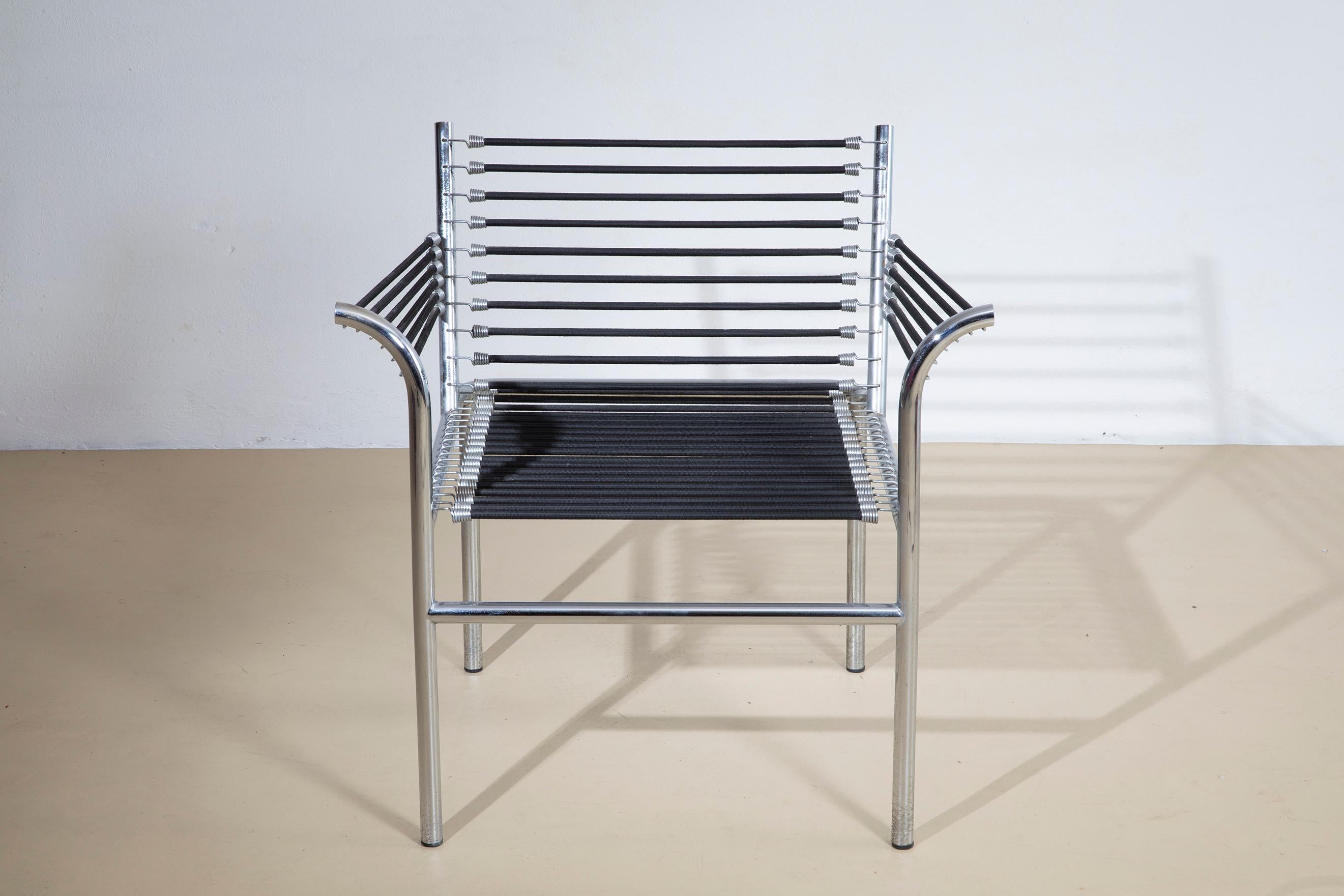 Sillón Renè Herbst, acero y cuerda elástica, años 70 Italian en venta